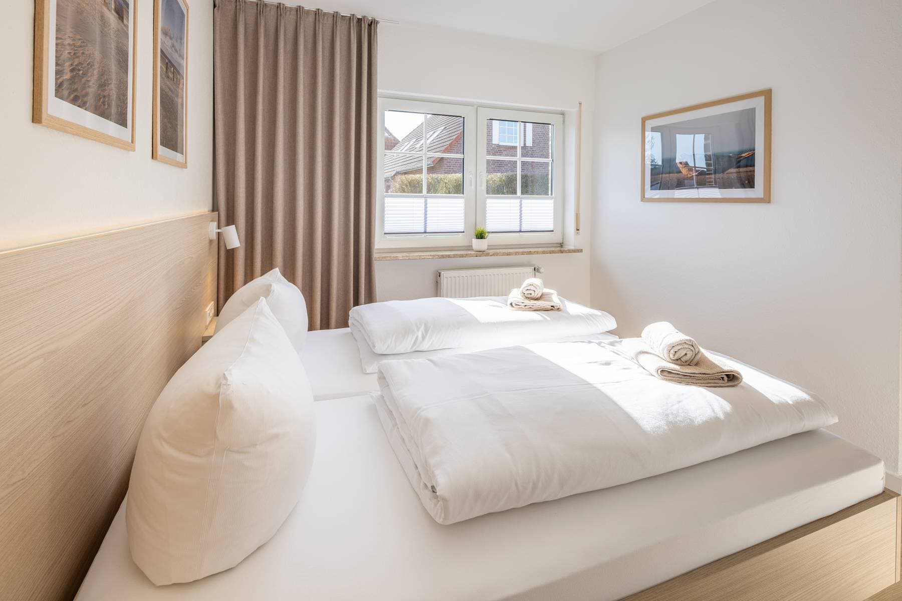 Ferienwohnung Riedgras 1 – Schlafzimmer mit Doppelbett